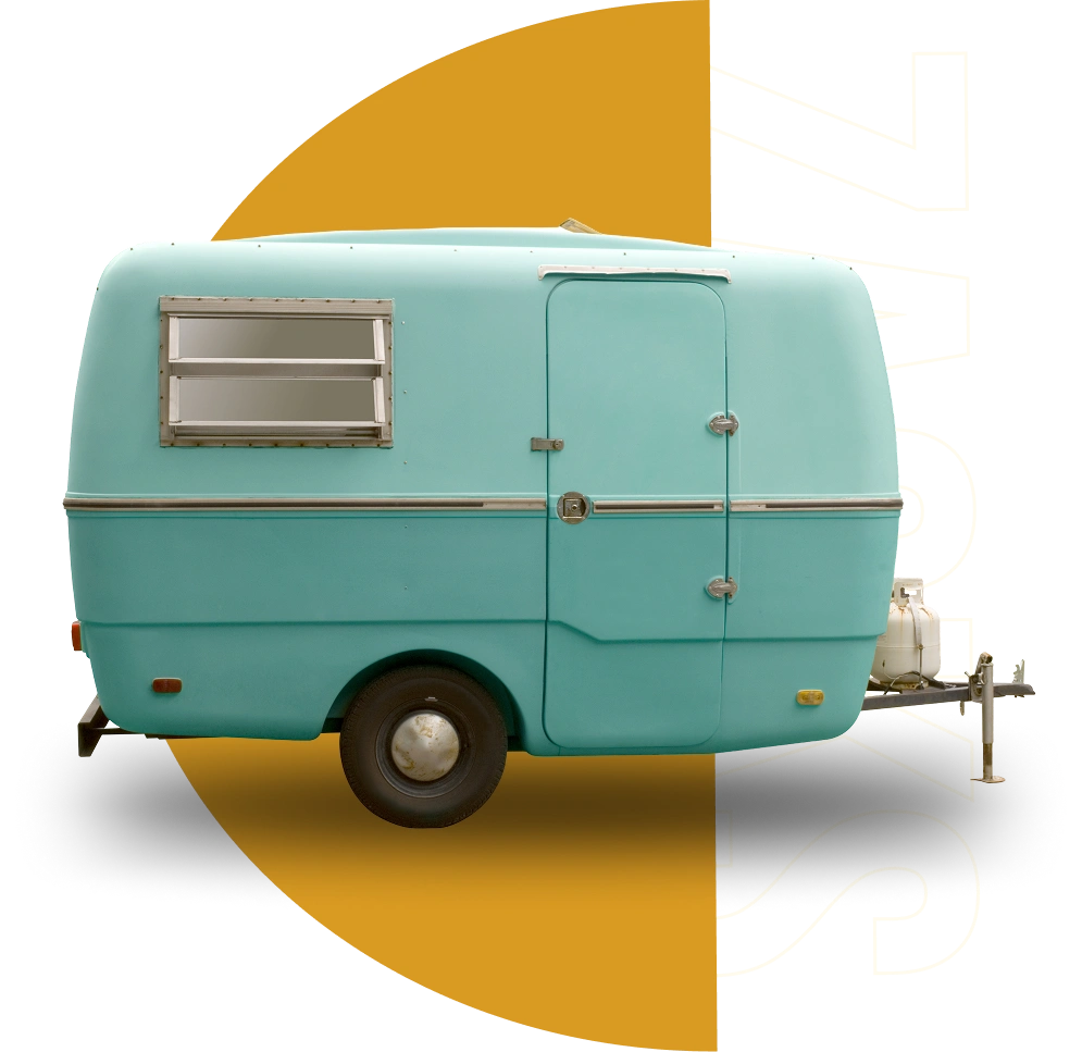 Classic teal trailer against modern art backdrop